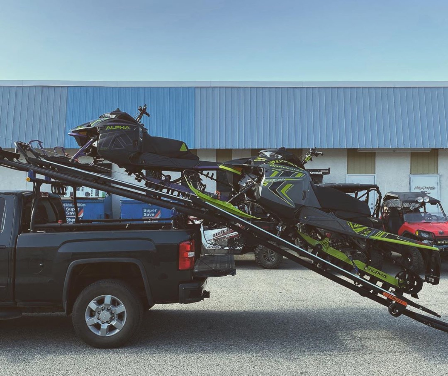 Two sleds — one up, one loading