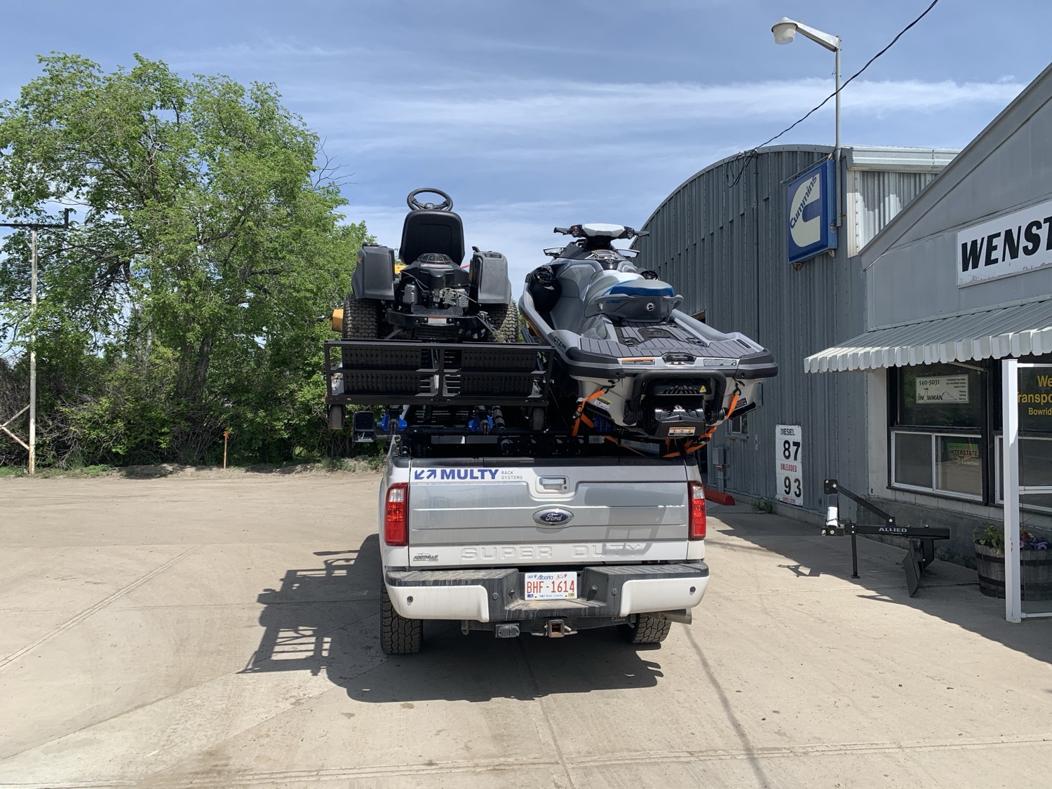 Lawn tractor and PWC together
