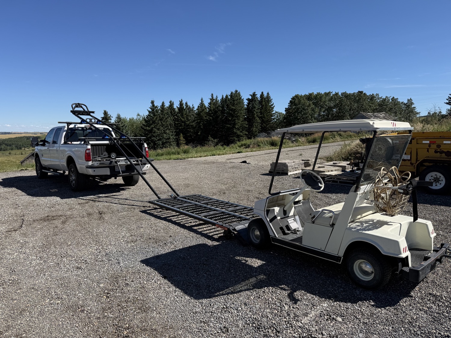 Golf cart at the foot of the rails